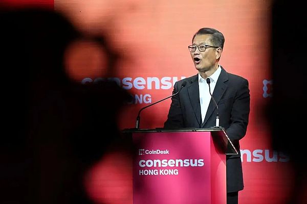 Hong Kong Financial Secretary Paul Chan Mo-po speaks at the opening of Consensus, Coindesk’s flagship cryptocurrency event, at the Convention and Exhibition Centre in Hong Kong on February 19, the first time Consensus was held outside the US in five years. Photo: AFP Hong Kong Financial Secretary Paul Chan Mo-po speaks at the opening of Consensus, Coindesk’s flagship cryptocurrency event, at the Convention and Exhibition Centre in Hong Kong on February 19, the first time Consensus was held outside the US in five years. Photo: AFP